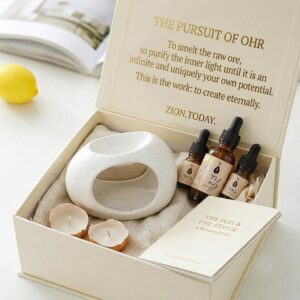 Zion Today gift set: eggshell candle burner, three oils and a booklet in a cream box